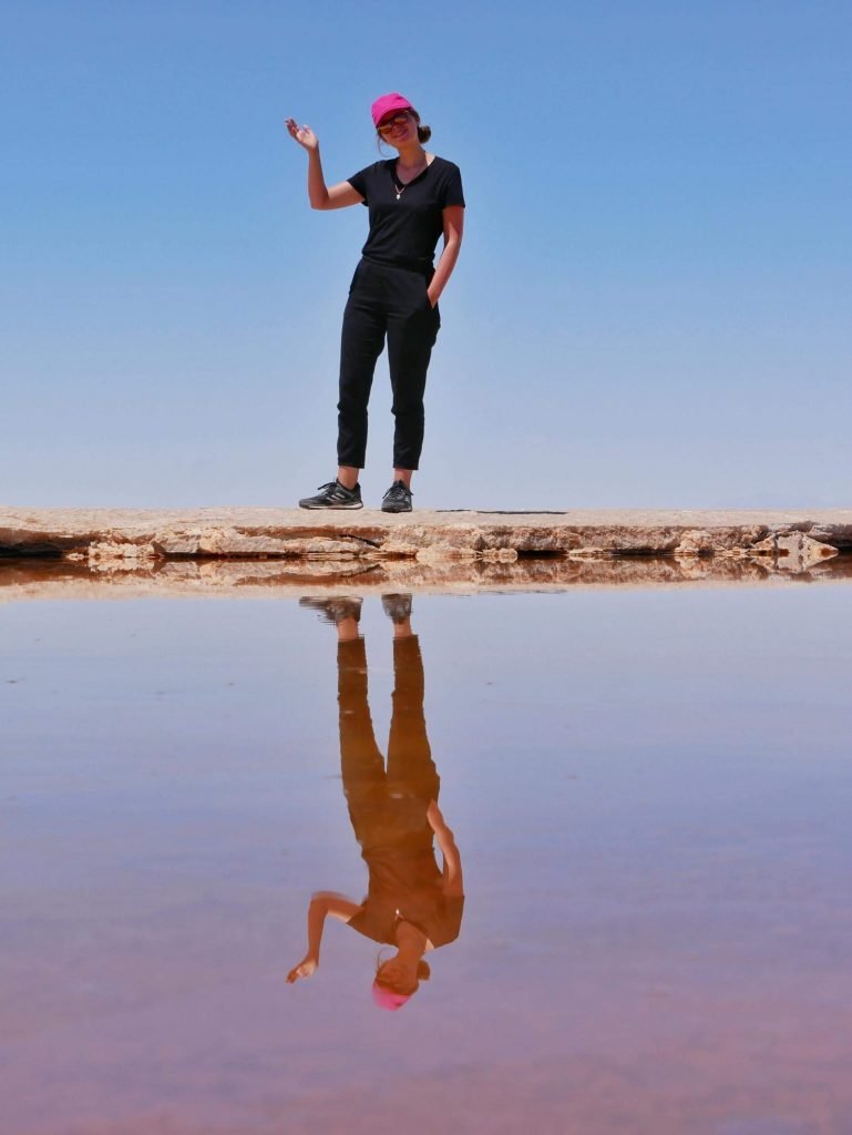 Britta Wiebe reflection in salt lagoon in uyuni salt flats, Bolivia