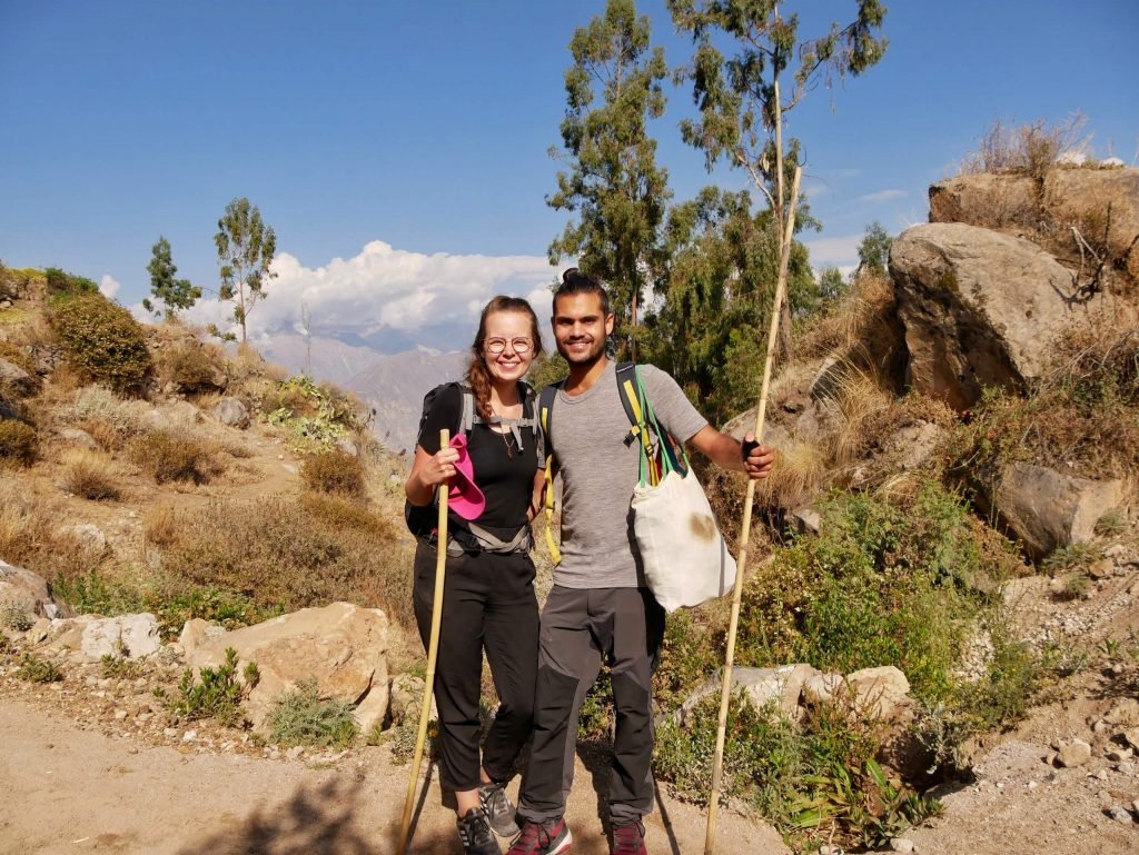 A couple standing on Colca canyon, Peru