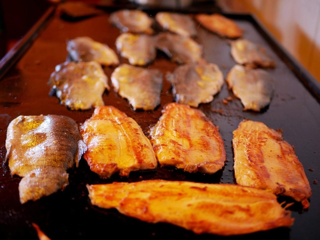 Grilling trout on Taquile island