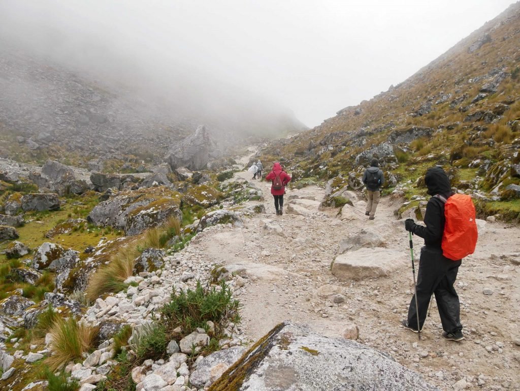 People walking down the Salkantay mountain