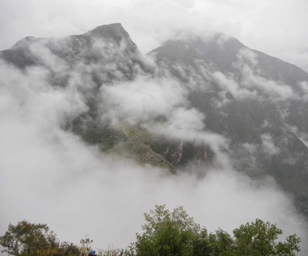 Cloudy view of Machu Picchu from huayna picchu