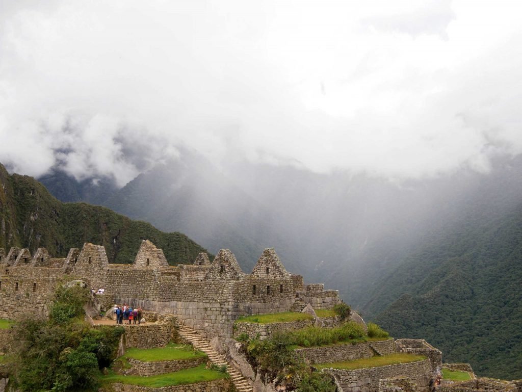 Machu Picchu views with rain clouds in the background