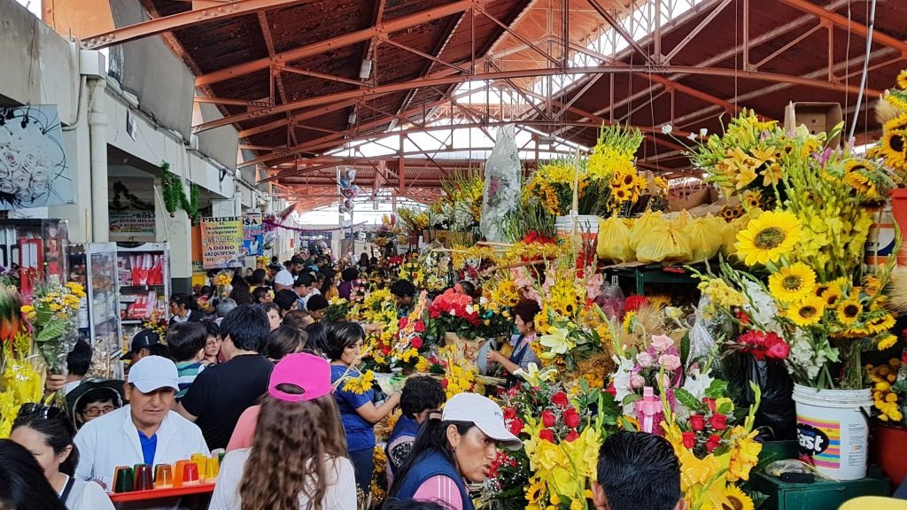 Selling flowers at San Camilo market in Arequipa, Peri