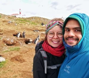 Jamin Mahmood and Britta Wiebe on Isla Magdalena watching two young Magellanic penguins