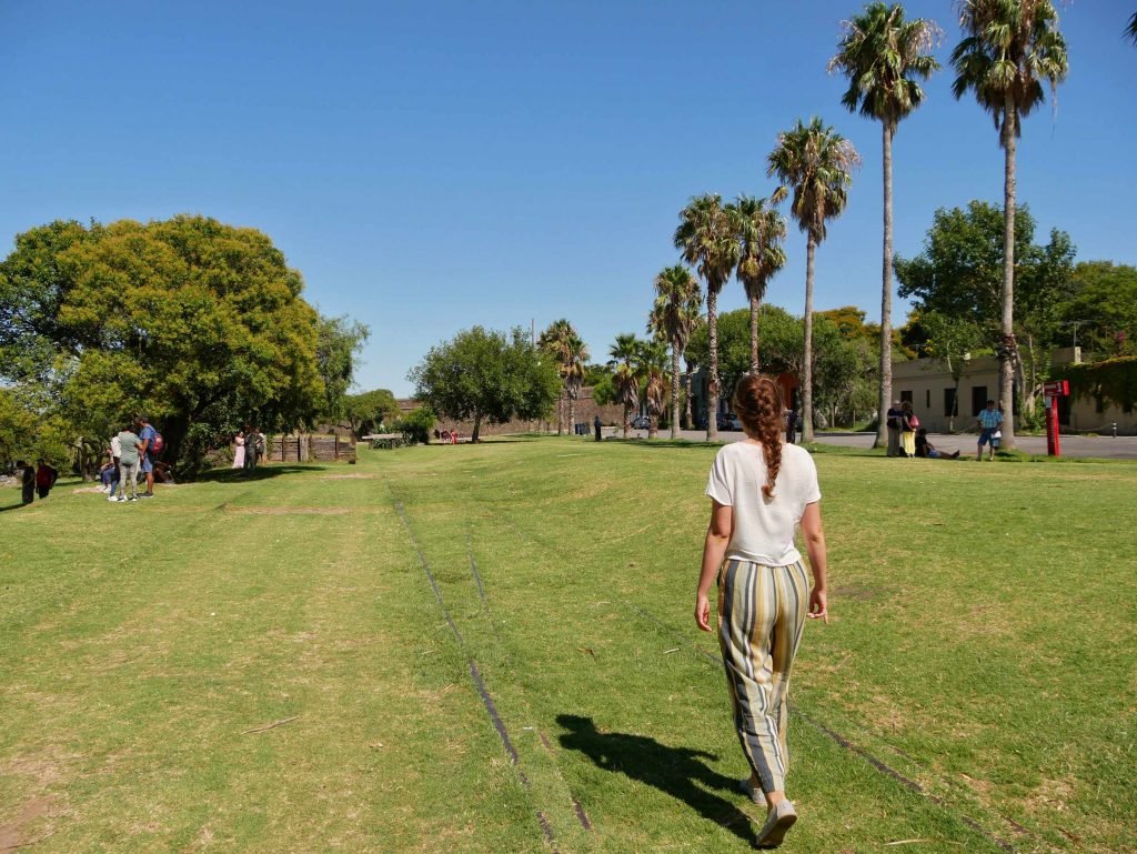girl walking in Colonia del Sacramento Uruguay