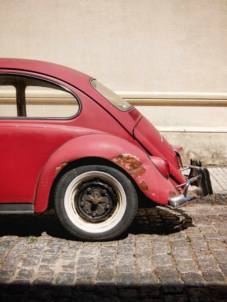 old red volkswagen beetle in Colonia del Sacramento Uruguay