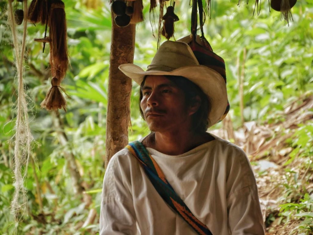 wiwa explaining about their culture in colombia